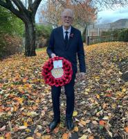 President Jim with wreath